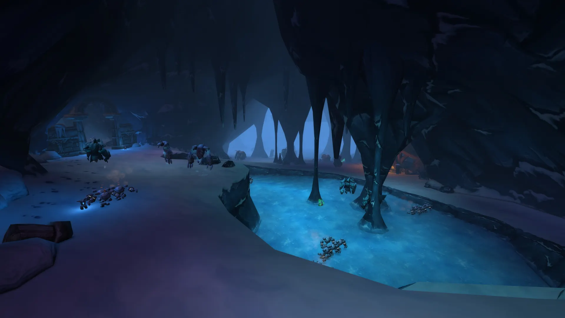 A frozen cavern with an icy pool inside the Barrow Deeps raid