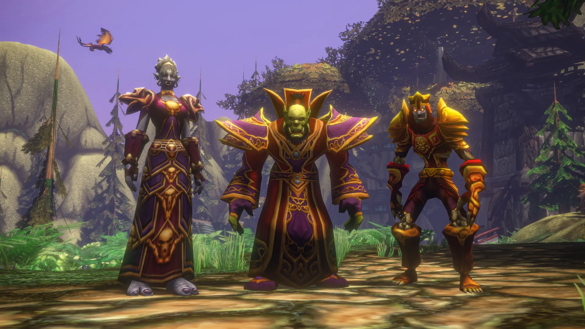 Three Horde characters, two in robes and one in gold plate armour, standing in a forest
